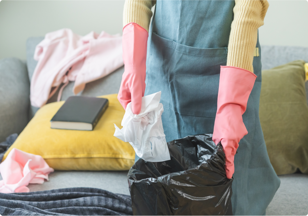 person cleaning up home