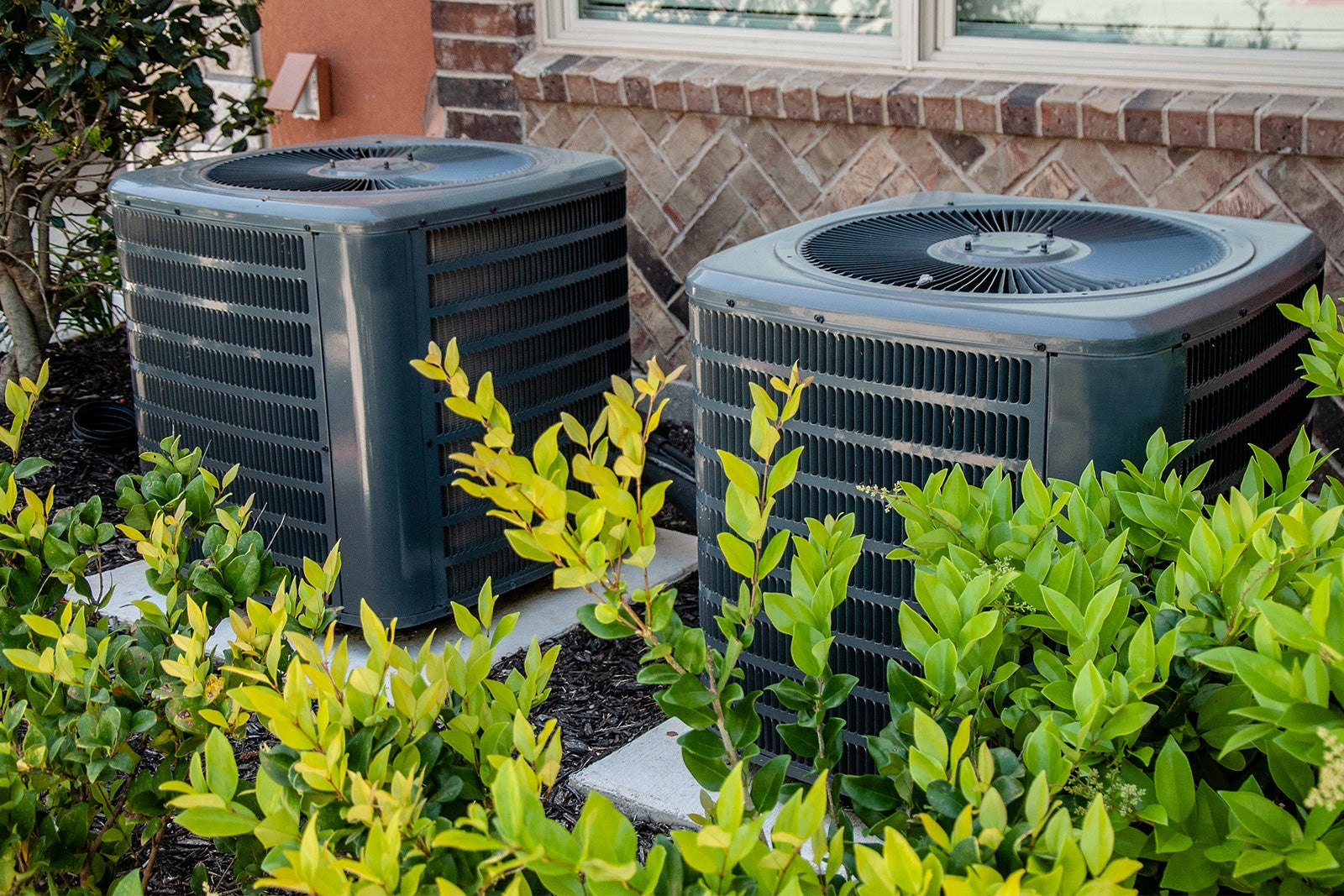 Two air conditioning units outside