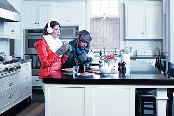 Cold couple in kitchen