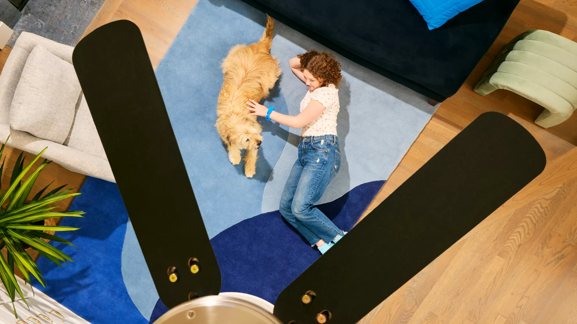 Female Pro inspecting a sink