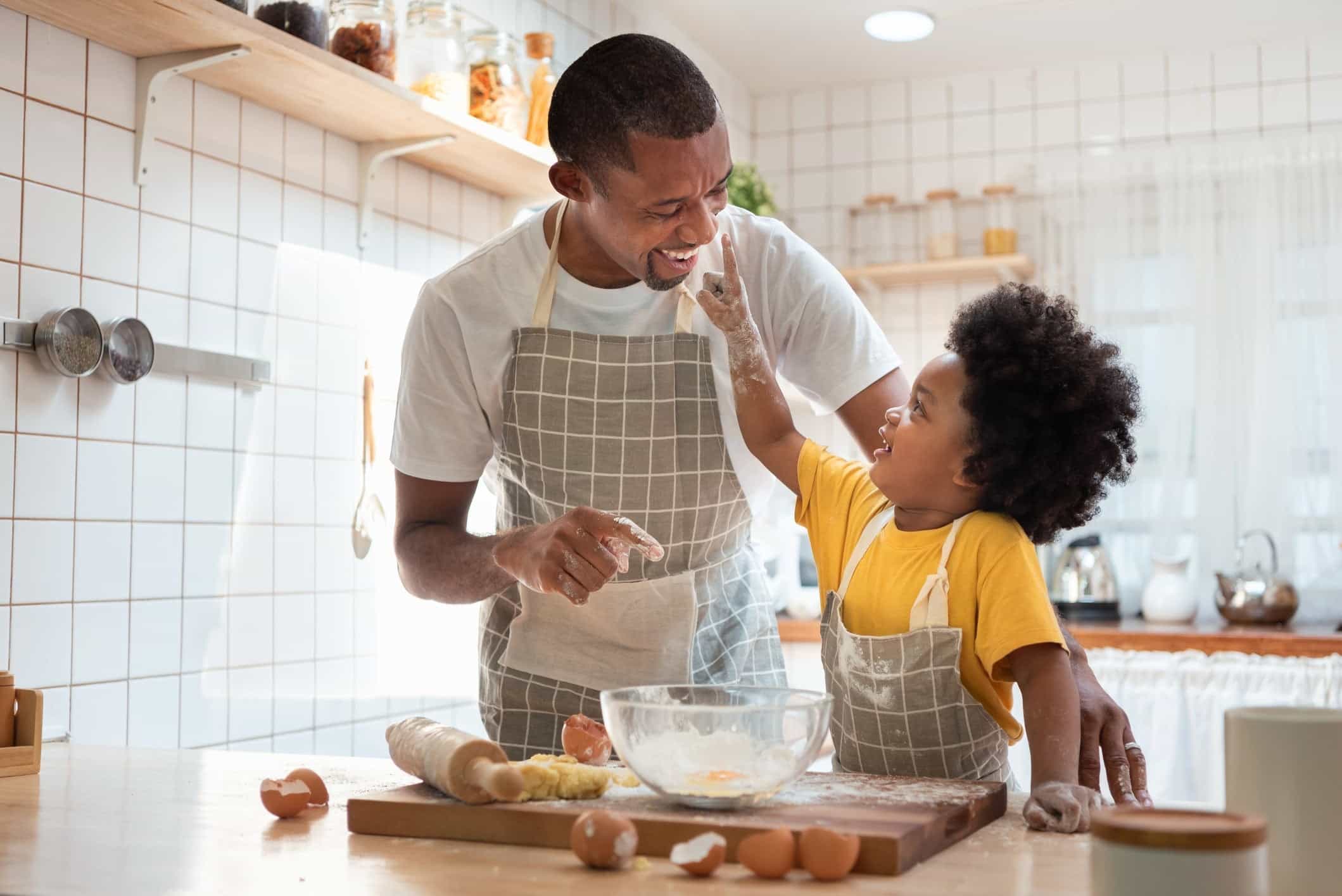 father and son in kitchen