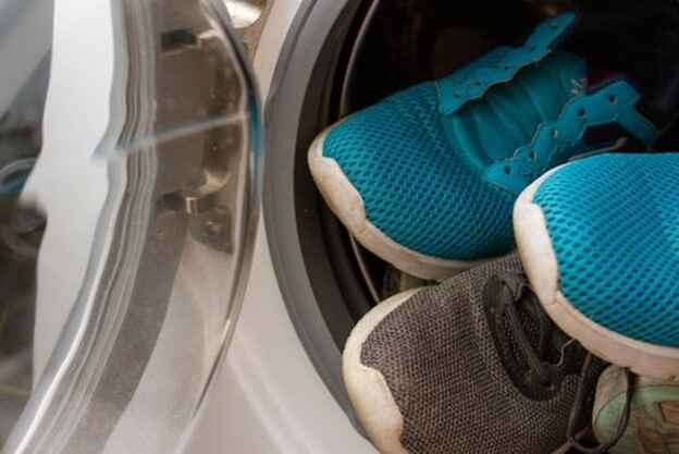 Place shoes in washing machine