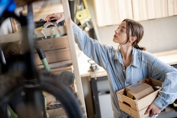 Women creating space in her garage