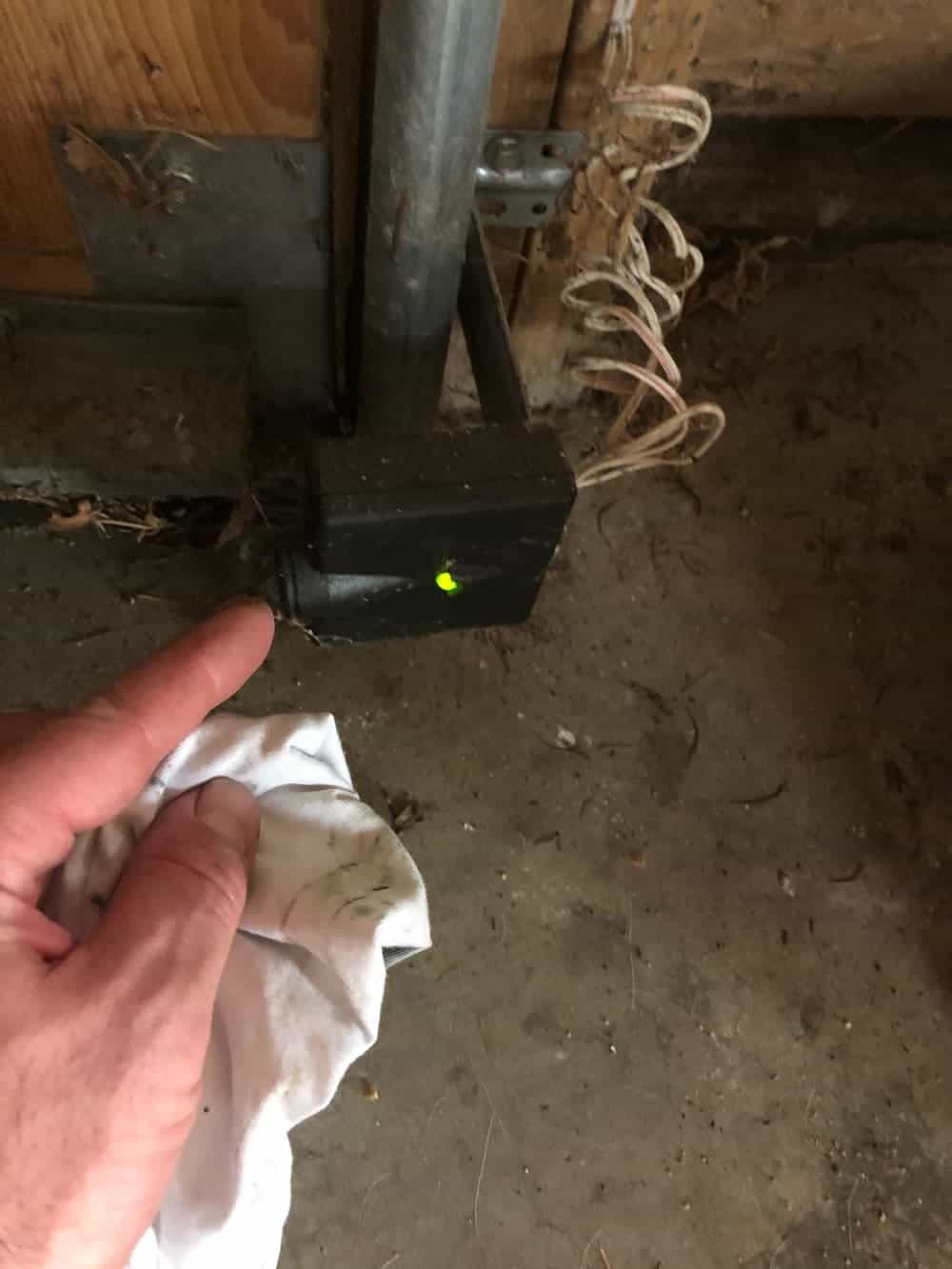 cleaning garage door sensor