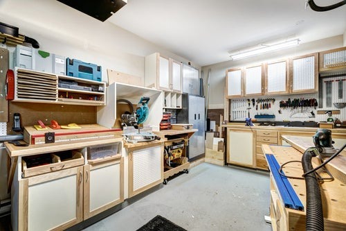 garage with many cabinets and shelves