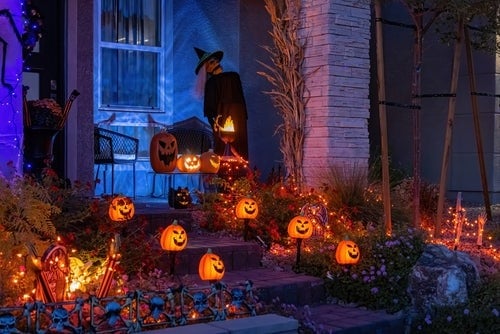 front steps decorated with jack o lanterns