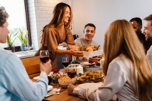 woman serving turkey