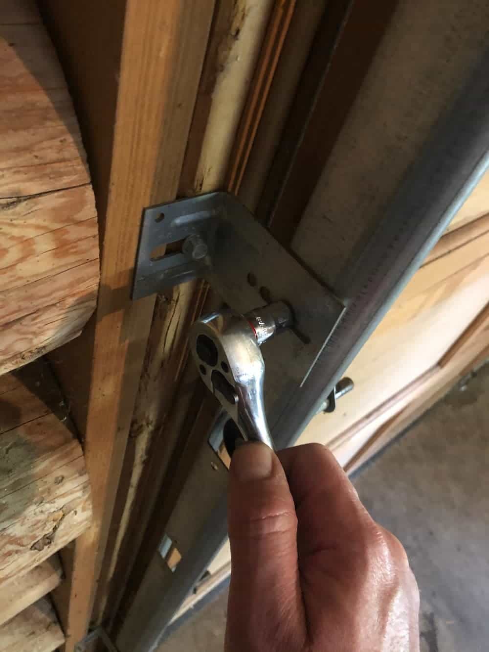 tightening garage door bolt