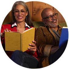 Couple sitting together for relaxed reading